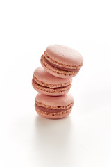 tower of three strawberry flavored macaroons