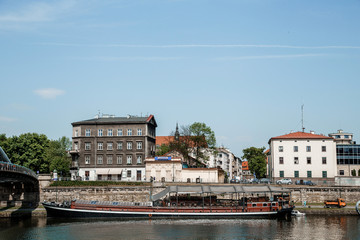 Street of the city of Krakow. The old Town. Public transport on the streets. Trams and buses. Polesha. City center.