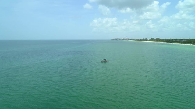 Aerial video boat in the water Gulf of Mexico Naples
