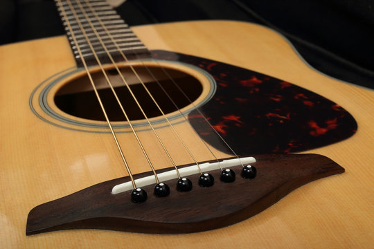 Classic acoustic guitar close-up. Details