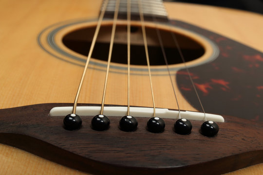Classic acoustic guitar close-up. Details