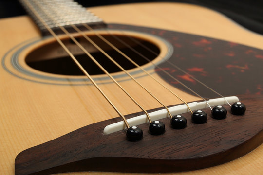 Classic acoustic guitar close-up. Details