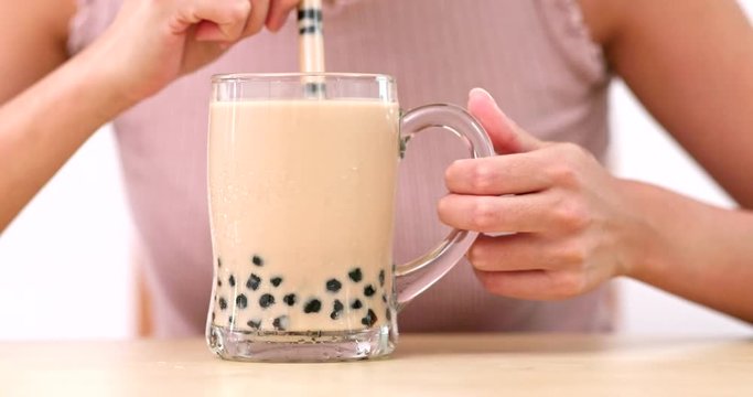 Woman drink of Iced bubble milk tea