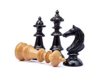 Old chess pieces isolated on white background