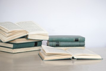 A stack of books on the table. Development and education concept.