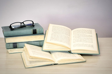 Education and reading concept - group of books on the wooden table
