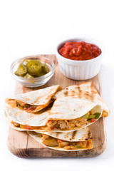 Mexican quesadilla with chicken, cheese and peppers, isolated on white background