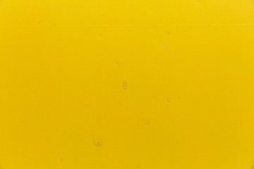 Yellow metal background.