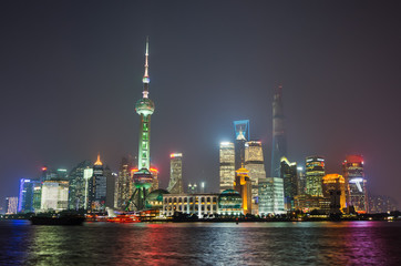 Fototapeta na wymiar Shanghai skyline at night, from Huangpu Park