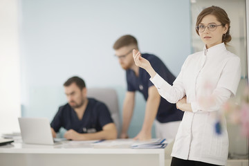 doctors medical consultation / group of doctors confer, medical clinic, work