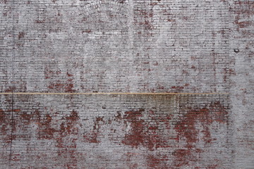 Weathered brick wall in the city