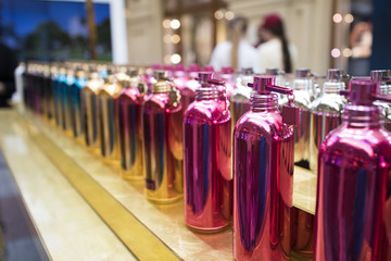 colorful perfume bottles on the counter