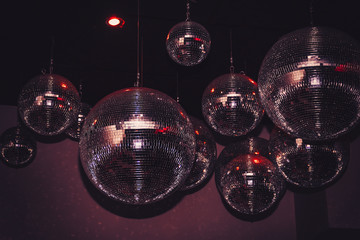 Disco balls in a nightclub room