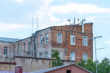 Many antennas on an old building