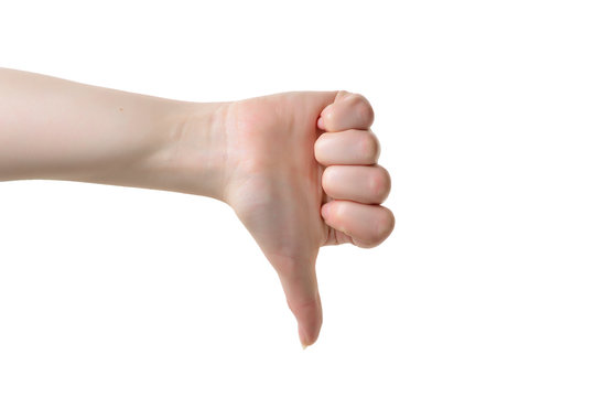 Thumb down female hand sign isolated on a white background. Symbol communication gesture object