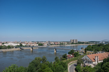 Fototapeta na wymiar Cityscape in Novi Sad with Varadin bridge (Duga) and the Danube river. From Petrovaradin fortress, Serbia