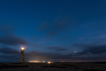Fototapeta premium San Roman Lighthouse at night with stars in Venezuela