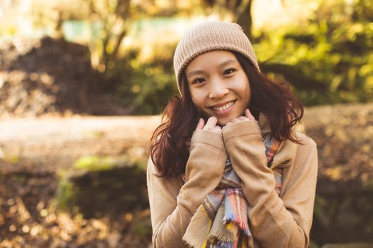 Beautiful Woman In Warm Clothing During Autumn