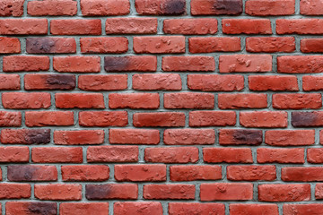 Red brick wall background texture.