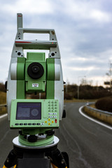 Surveyor, total positioning station on the site