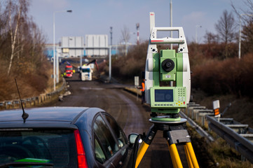 Surveyor, total positioning station on the site