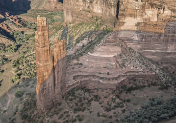 Rock formations in Canyon de Chelly National Monument.  Views of the huge canyon found within this part of the Arizona desert The huge rock Hoodoo twin tower found in Arizona, USA