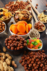 Composition with dried fruits and assorted nuts