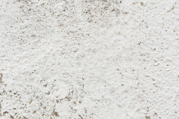 Wall fragment with scratches and cracks