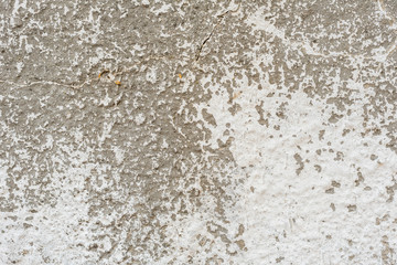 Wall fragment with scratches and cracks