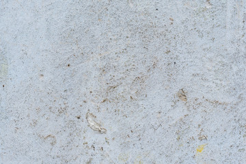 Wall fragment with scratches and cracks