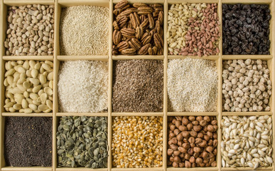 Assorted seeds crate Several seeds displayed in a wooden crate