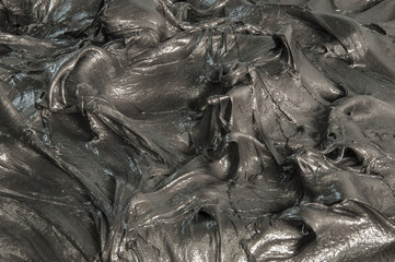 Black lubricating grease Close-up shot of special lubrication for automotive uses