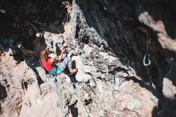 A climber climbs the rock.