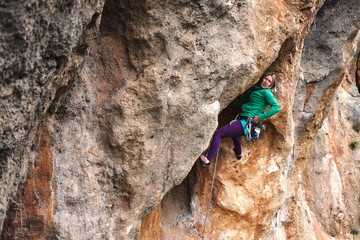 A rock climber on a rock.