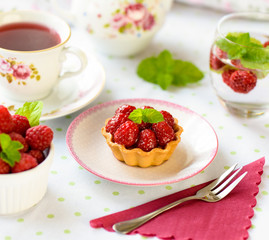 Mini tarts with raspberries fruits