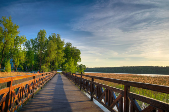 Squirrel path in Olecko -  route around the Olecko Wielkie Lake. View from the lake. Masuria, Poland.