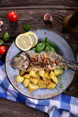 Fried bream fish with potatoes