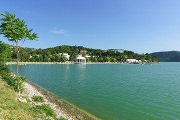 Fototapeta na wymiar Picturesque lake Abrau on the background of mountain slopes. Peace and quiet