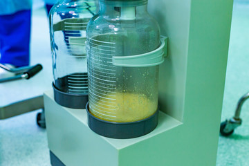 The bottles for the fat liquid from liposuction