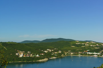 Fototapeta na wymiar Top view of the slopes of the Caucasus mountains around the picturesque lake Abrau