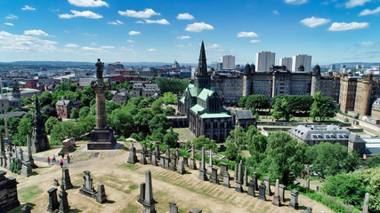 Aerial image over Glasgow Necropolis, a Victorian garden cemetery, and the medieval Cathedral.