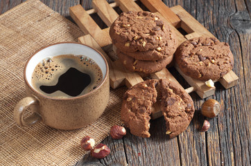 Coffee and cookies with hazelnuts