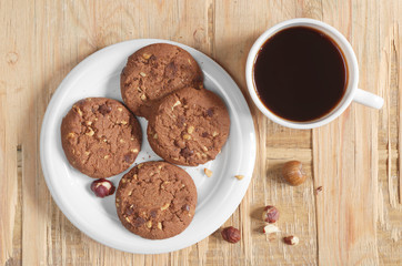 Coffee and cookies with hazelnuts