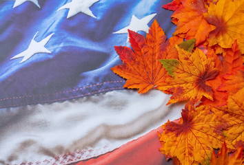 USA flag background with autumn leaves border and room for text