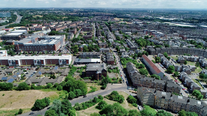 Fototapeta na wymiar Aerial image over Glasgow looking East from the East end of the city.