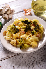 Pasta with broccoli and chicken with cheese sauce