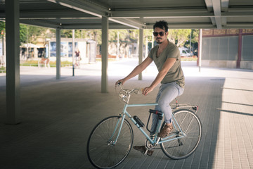 Fototapeta na wymiar man with a vintage bicycle