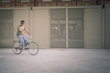 Fototapeta na wymiar man with a vintage bicycle