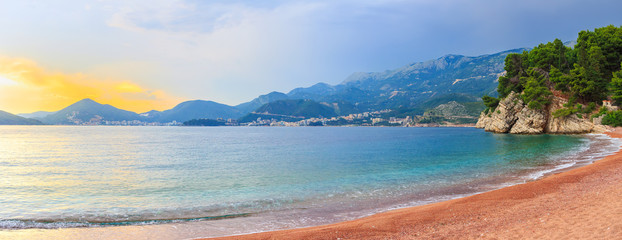 Awesome tropical sunset on Adriatic sea coastline in Montenegro, gorgeous summer seascape and nature landscape