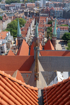 8 July 2018, Townscape  with red roofs in old city Gdansk, Poland, made from top, aerial landscape with tilt-shift effect in summer